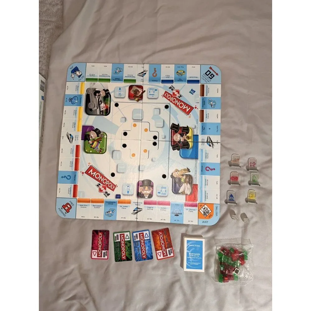 Monopoly Zapped Edition Board Game Hasbro 2012 Complete Works with iPad iPhone